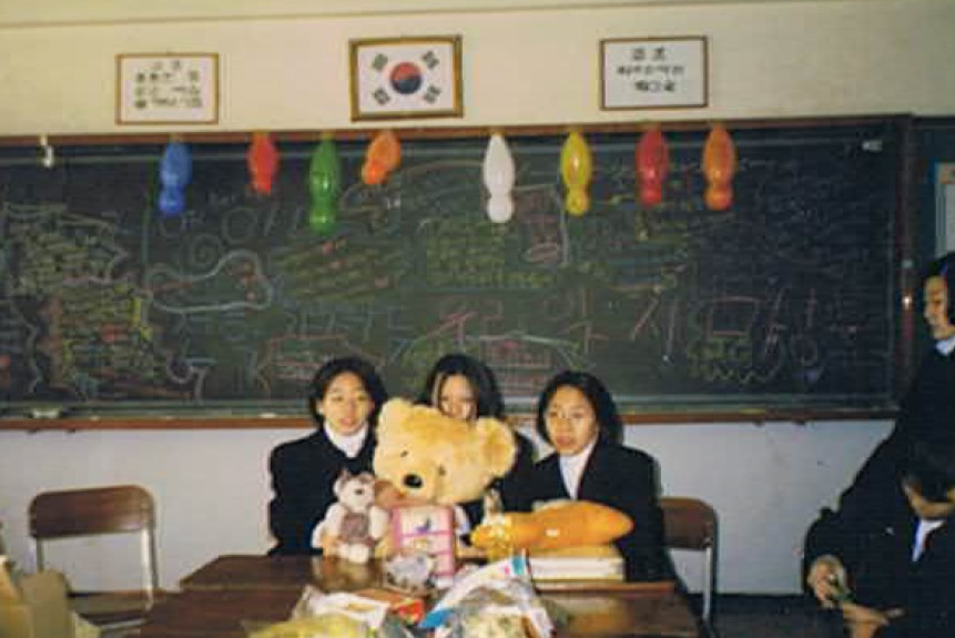 Susan and her friends at school in South Korea.