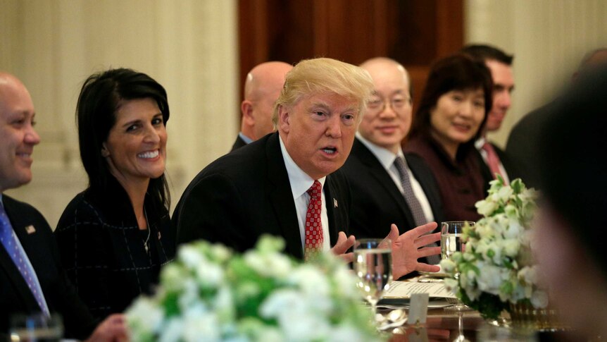Donald Trump with US ambassador to the UN Nikki Haley at his side.