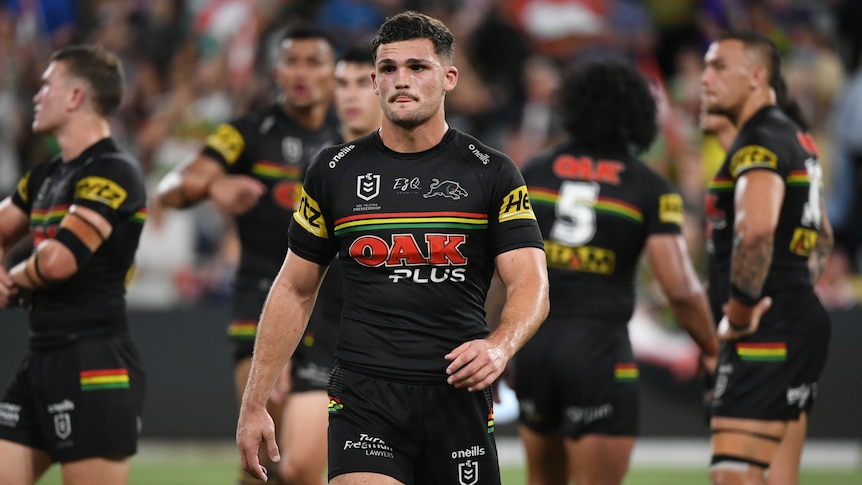 Penrith Panthers' Nathan Cleary walks off the field after losing an NRL finals game against South Sydney Rabbitohs.