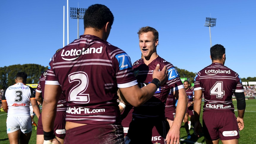 Daly Cherry-Evans and Manly Sea Eagles celebrate a try