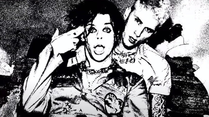 Grainy filtered black and white shot of YUNGBLUD and Machine Gun Kelly