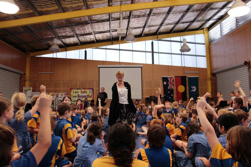 Trish Jackson presents to young school children