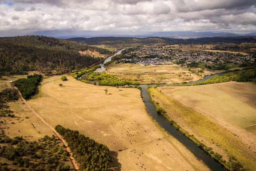 aerial shot of river and paddocks