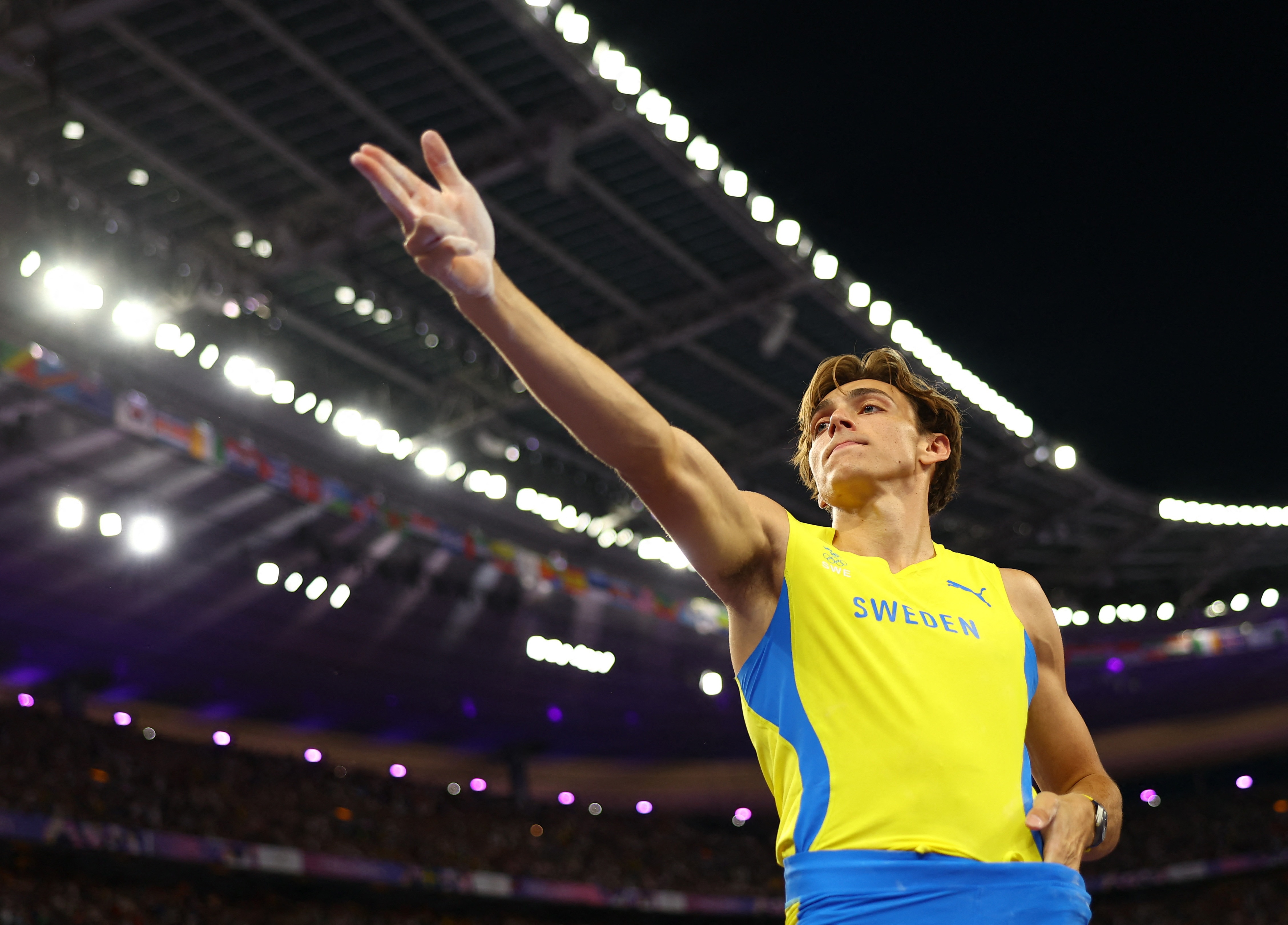 Bruce McAvaney on the athlete re-setting the world record 1cm at a time