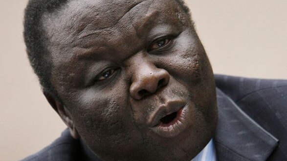 Zimbabwe's Opposition Leader Morgan Tsvangirai gestures as he addresses journalists during a press c