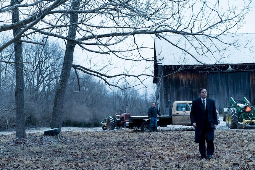 Mark Ruffalo and Bill Camp in frozen farmland in the movie Dark Waters
