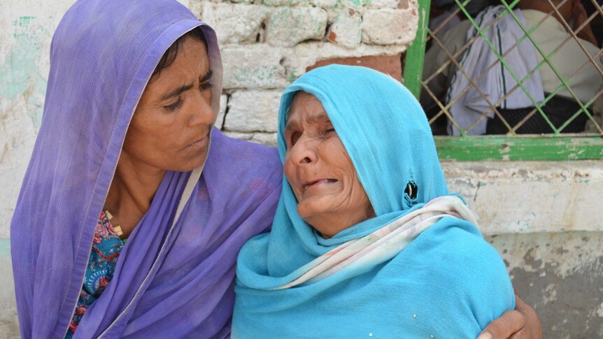 Jebuna Begum (R), the wife of a man beaten to death by 'cow vigilantes'.