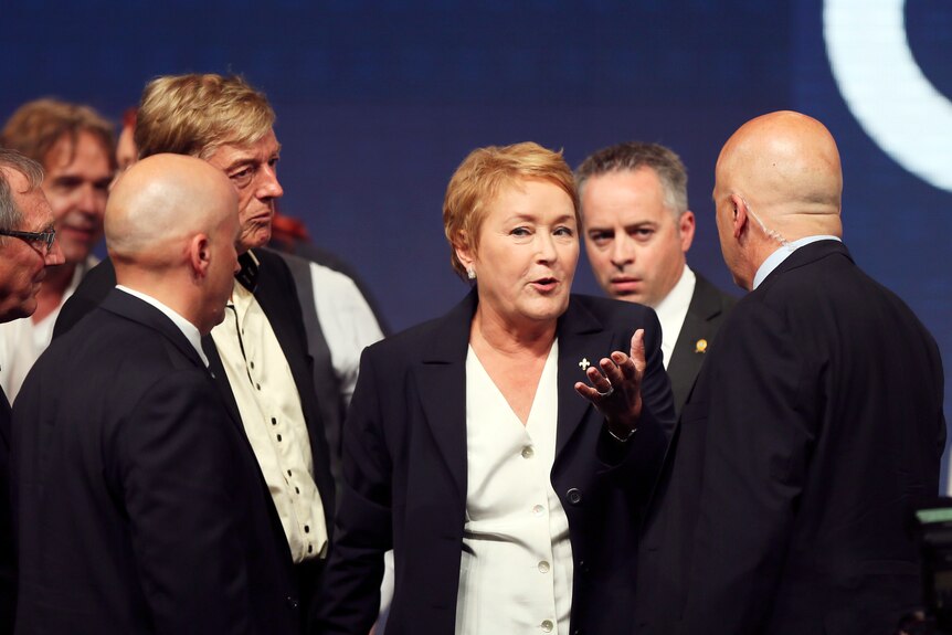Marois speaks with security after Quebec shooting