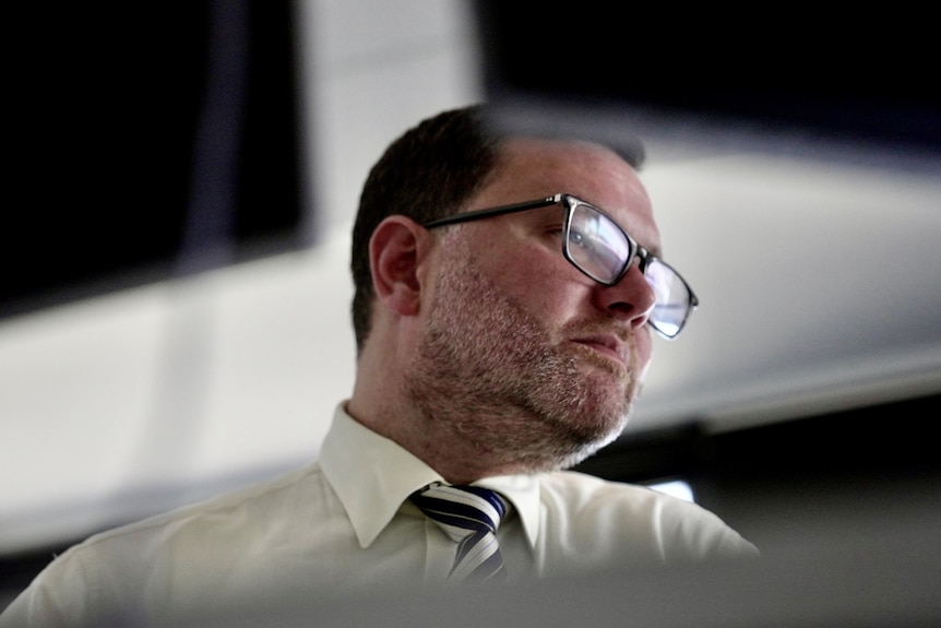 Marc Chiarella wearing a white shirt and stripped tie.