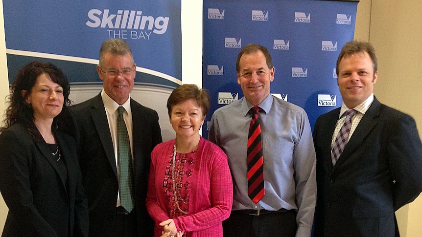 Deakin University vice-chancellor Jane den Hollander (centre) says a freeze on fees is "fair and equitable".