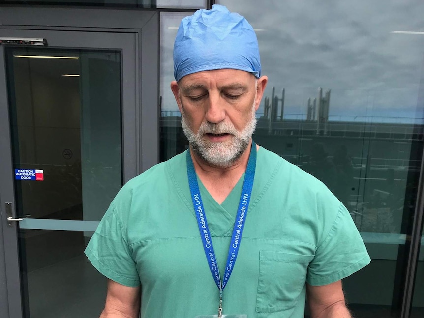 The head of the Royal Adelaide Hospital's burns unit Professor John Greenwood dressed in scrubs