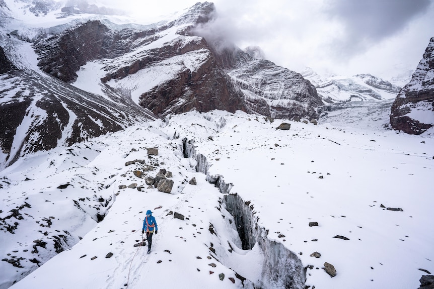 A woman on a glacier.