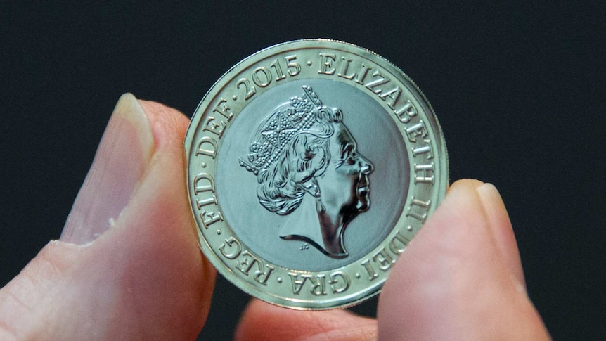 A coin depicting the new coinage portrait of Her Majesty Queen Elizabeth II