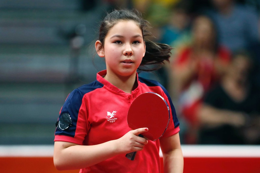 Welsh table tennis player Anna Hursey holds her paddle during a match