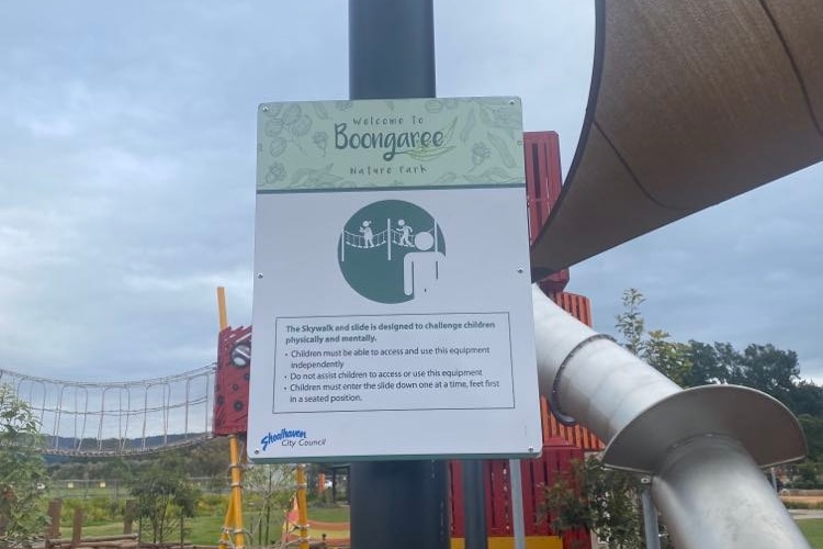 A warning sign at a playground.