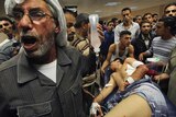 Wounded Palestinian wheeled to Gaza hospital