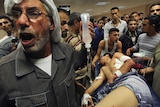 Wounded Palestinian wheeled to Gaza hospital