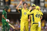 Australia's Pat Cummins (C) celebrates a wicket with team-mates in ODI against Pakistan at Gabba.