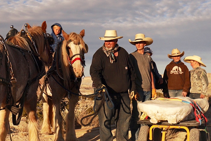 The Bartlett family and their two horses that help recover a giant dinosaur fossil from a gully in Utah