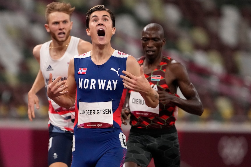 A Norwegian athlete celebrates after winning the  men's1,500 metres at the Tokyo Olympics.