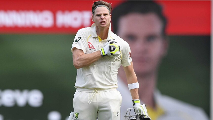 Steve Smith shows his emotion after reaching his century on day three.