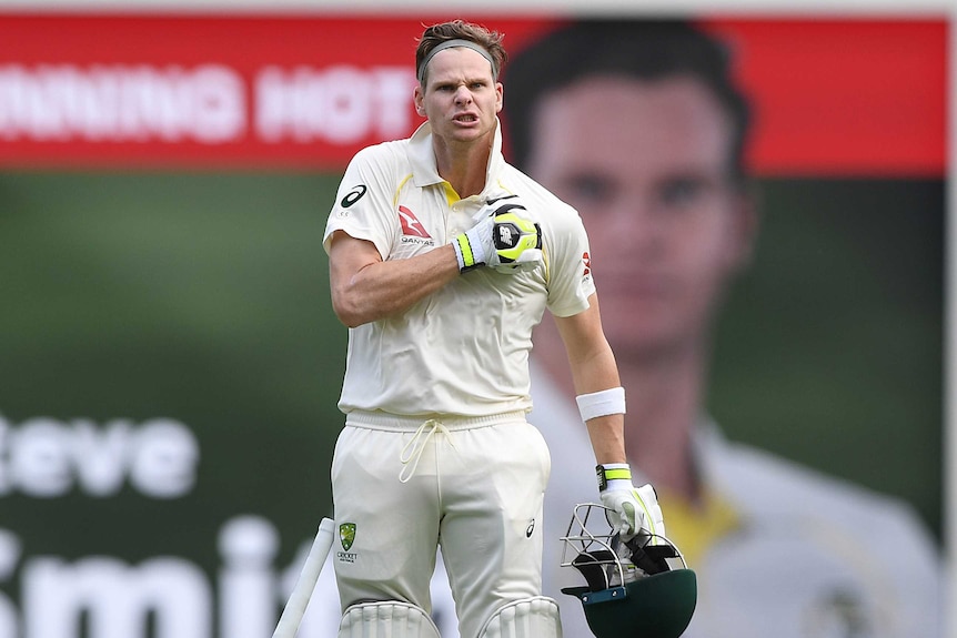 Steve Smith reacts after scoring a century against England on day three at the Gabba