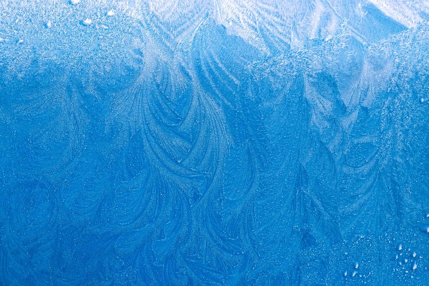 A swirling icy pattern on window
