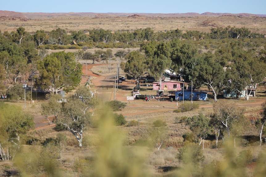 A landscape photo of a small community in the bush.