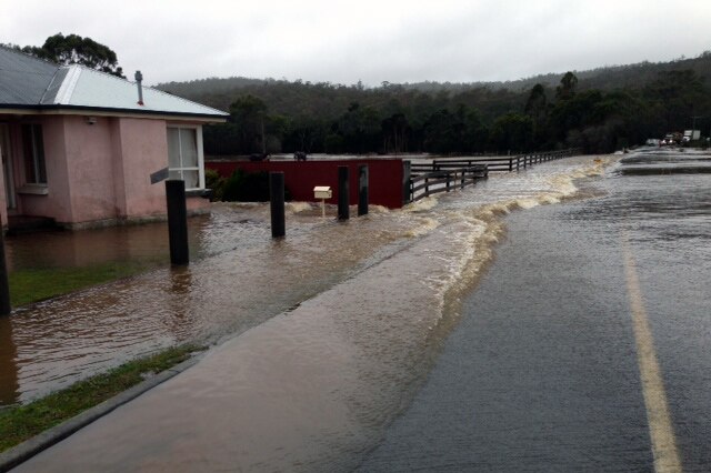 A home is inundated by rising flood waters in Rocherlea in northern Tasmania.