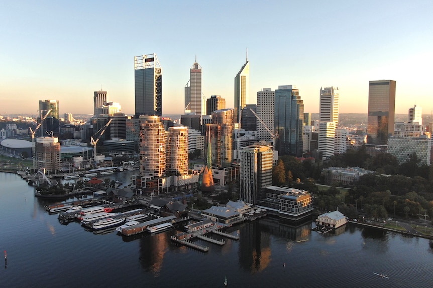 The Perth city skyline at dawn.