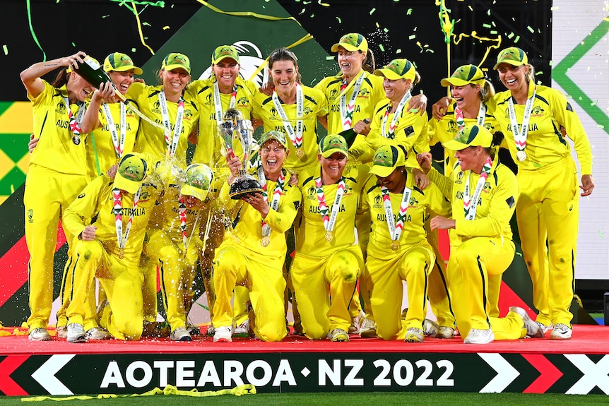 Australia's women's cricket team celebrate winning the World Cup.