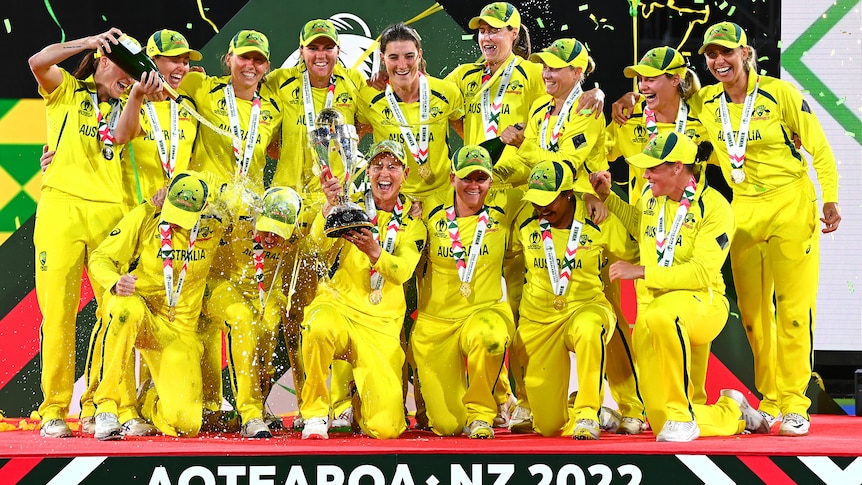 Australia's women's cricket team celebrate winning the World Cup.