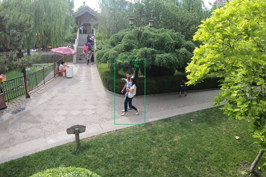 Dandan Fan and her family walk through a Beijing park.