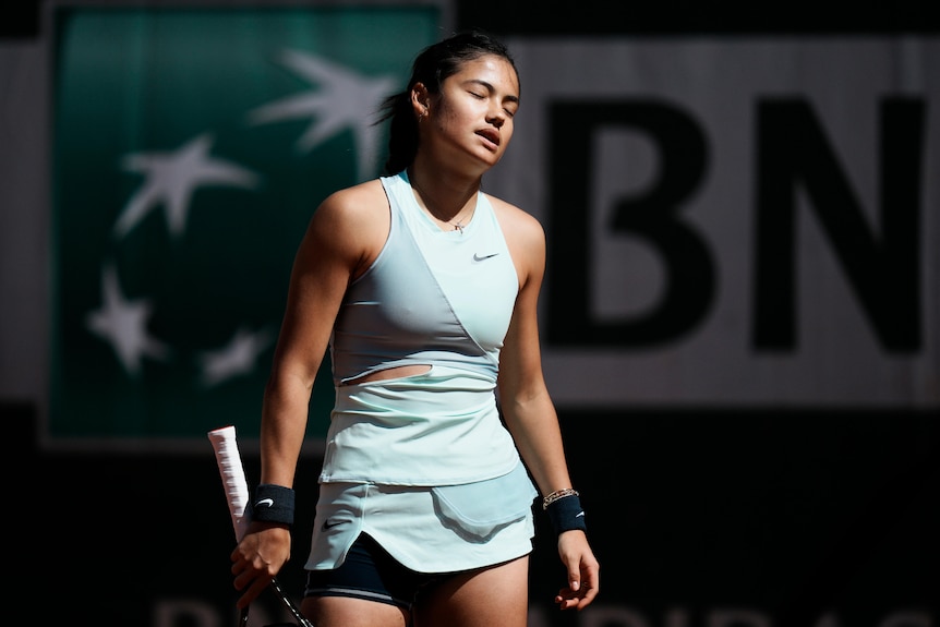 tennis player emma raducanu reacts disappointedly during a match at the french open 