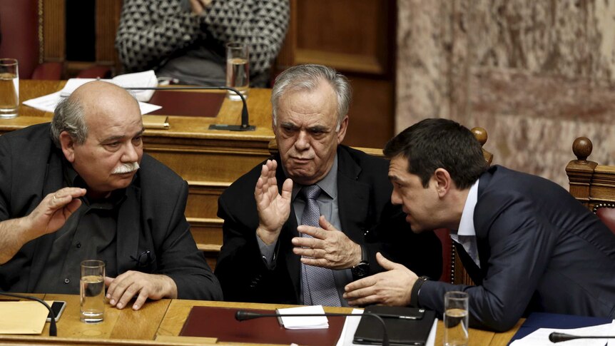 Greek interior minister Nikos Voutsis (left) says Greece will be unable to make its June repayment to the IMF.
