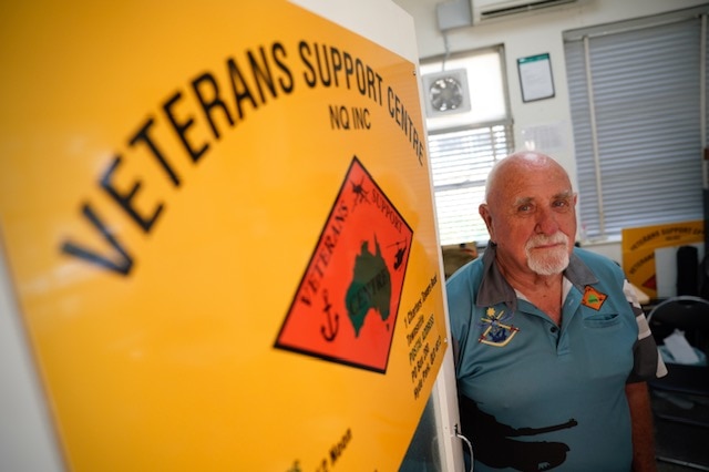 Veteran Chris Mills stands at the door to his office at the Townsville Veterans Support Centre.