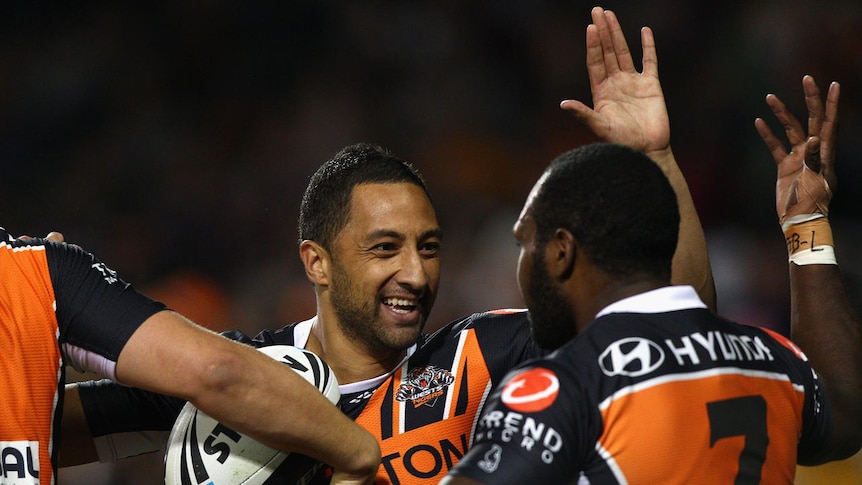 Too much class... Benji Marshall and Robert Lui celebrate a Tigers try at Campbelltown Sports Stadium.