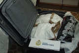 A suitcase containing 95 kilograms of cocaine.