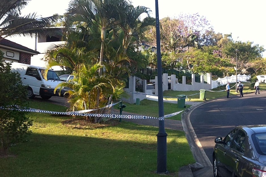 Police tape surrounds a residence at Arundel after a police officer was shot at the Arundel Tavern.