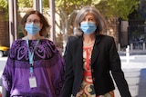 Nicola Spurrier walking into court wearing a face mask