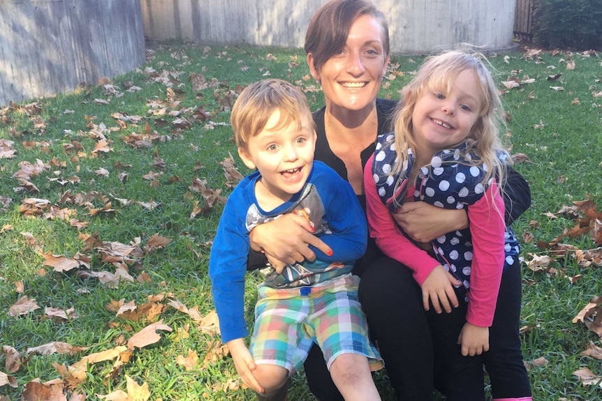 Domestic violence survivor Jen Armstrong with her children Isabelle and Harvey.