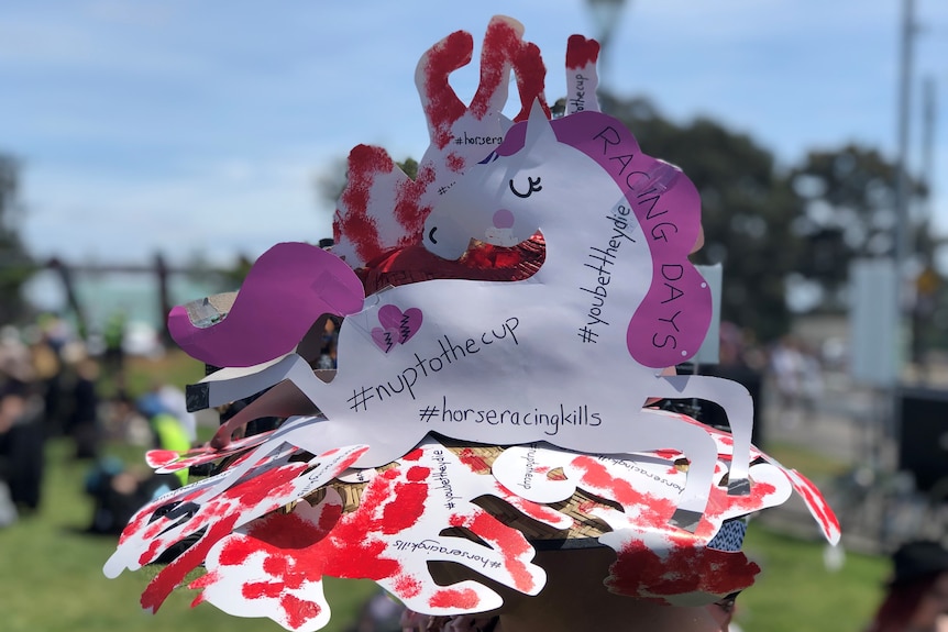 A homemade fascinator showing dead horses.