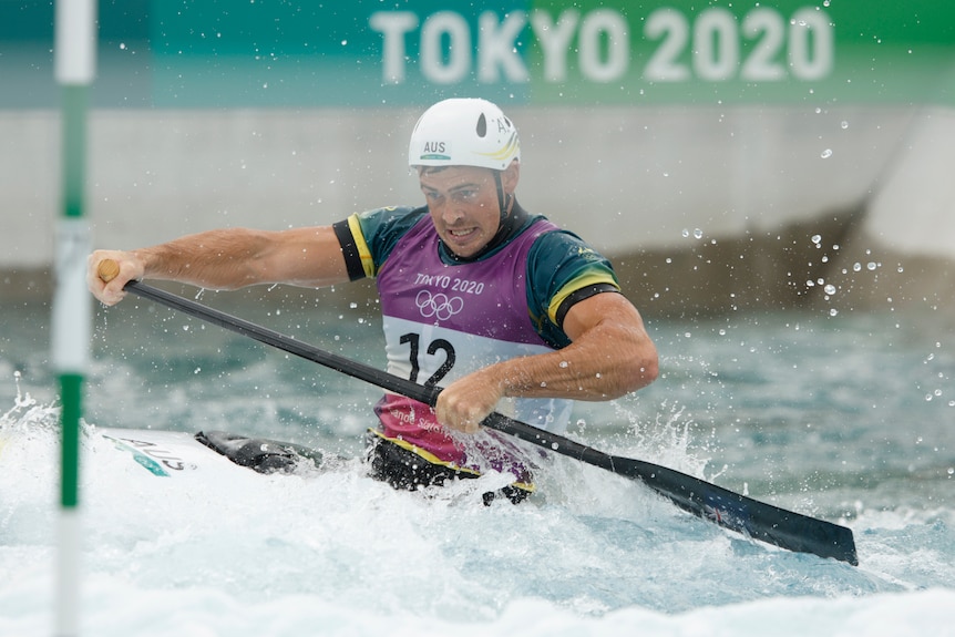 Daniel Watkins paddles in the men's canoe slalom