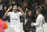 Tottenham Hotspur's Clint Dempsey (L) celebrates scoring the equaliser against Manchester United.