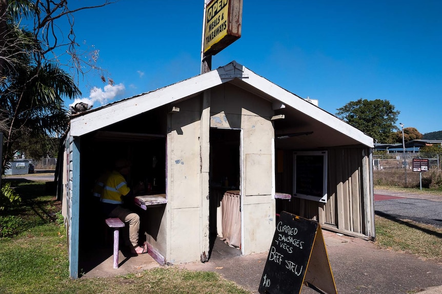 Outside of the pie cart, with its ramshackle roof and tacked on walls that show its age