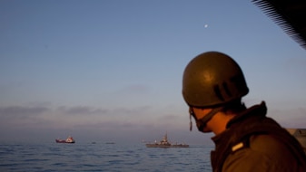 Israeli Navy soldiers stand guard on a missile ship, May 31 (Getty Images: Uriel Sinai)
