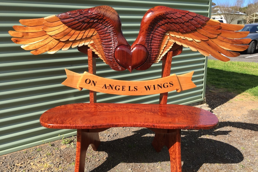 bench with angel wings