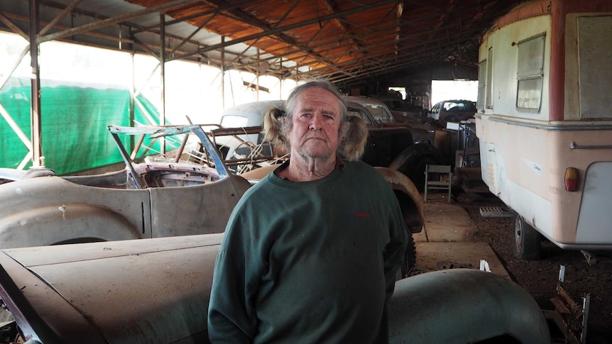 Jon Blaikie with some of his car collection.