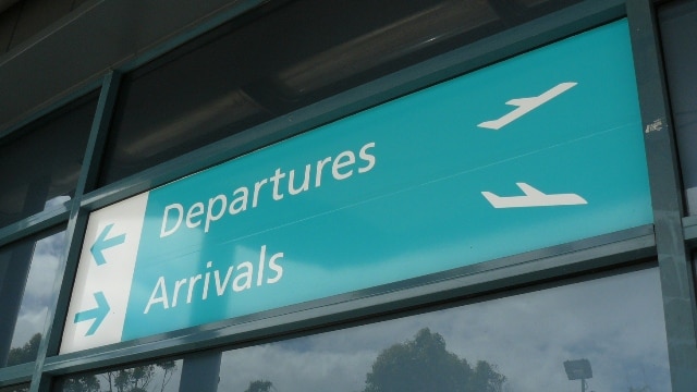 Arrivals and departures sign, Newcastle airport at Williamtown.