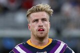 Cameron Munster of the Storm prepares to catch the ball against the Bulldogs in Perth.